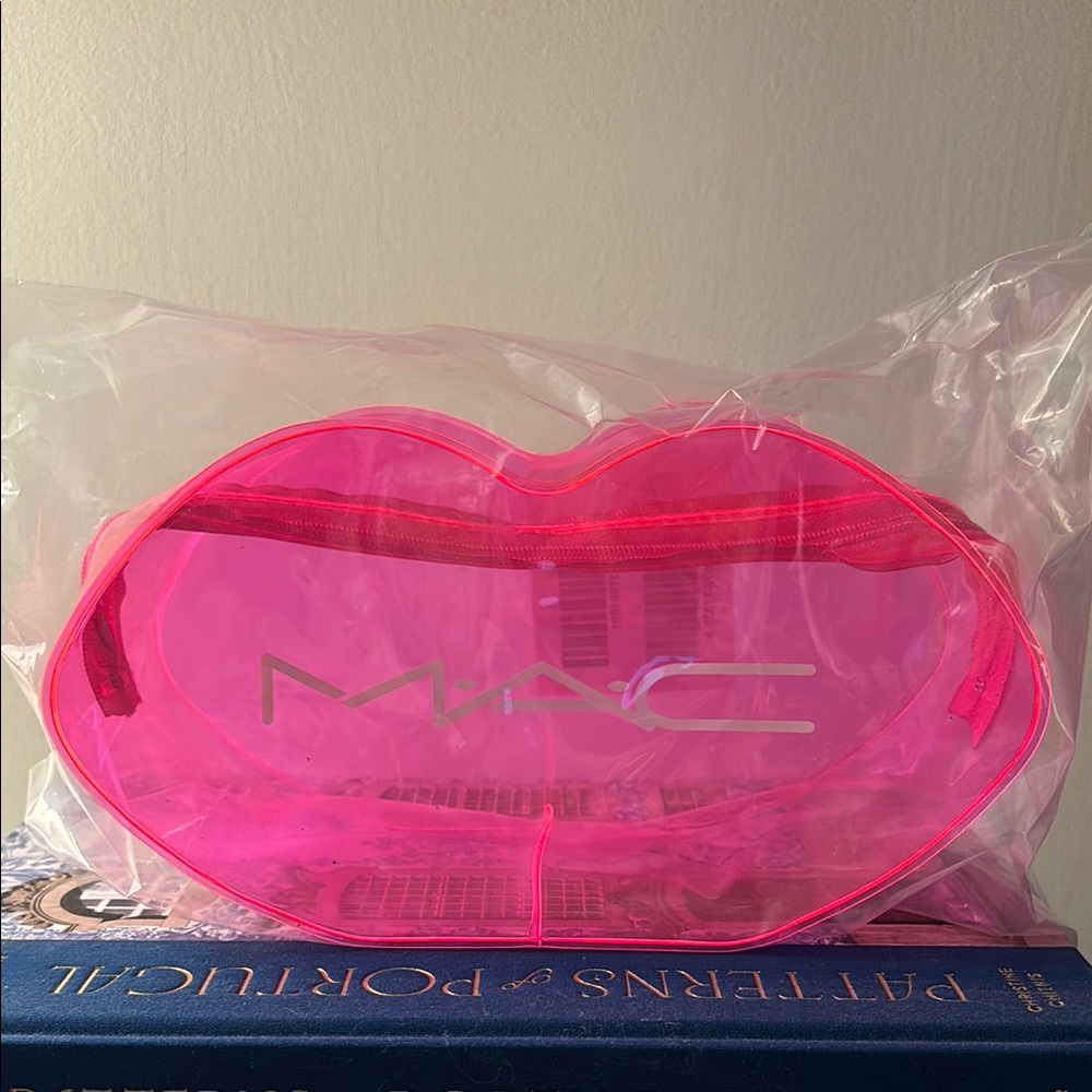 MAC Pink Lip Shaped Cosmetic Bag.  New with tag in unopened plastic bag.